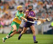 12 September 2010; Aislinn Connolly, Offaly, in action against Claire O'Connor, Wexford. Gala All-Ireland Intermediate Camogie Championship Final, Wexford v Offaly, Croke Park, Dublin. Picture credit: Oliver McVeigh / SPORTSFILE