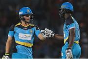 21 July 2016; Zouks batsmen (L) David Miller and Darren Sammy (R) during Match 21 of the Hero Caribbean Premier League match between the St Lucia Zouks and the Nevis Patriots at the Daren Sammy Cricket Stadium, Gros Islet, St Lucia.  Photo by Ashley Allen/Sportsfile