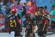 21 July 2016; St. Kitts and Nevis Patriots celebrate the wicket of Johnson Charles during Match 21 of the Hero Caribbean Premier League match between the St Lucia Zouks and the Nevis Patriots at the Daren Sammy Cricket Stadium, Gros Islet, St Lucia.  Photo by Ashley Allen/Sportsfile