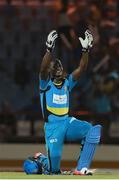 21 July 2016; Darren Sammy celebrates his 50 infront his home crowd during Match 21 of the Hero Caribbean Premier League match between the St Lucia Zouks and the Nevis Patriots at the Daren Sammy Cricket Stadium, Gros Islet, St Lucia.  Photo by Ashley Allen/Sportsfile