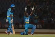 21 July 2016; Daren Sammy celebrates reaching 50 infront his home crowd during Match 21 of the Hero Caribbean Premier League match between the St Lucia Zouks and the Nevis Patriots at the Daren Sammy Cricket Stadium, Gros Islet, St Lucia.  Photo by Ashley Allen/Sportsfile