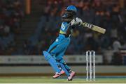 21 July 2016; Zouks captain Daren Sammy on the attack during Match 21 of the Hero Caribbean Premier League match between the St Lucia Zouks and the Nevis Patriots at the Daren Sammy Cricket Stadium, Gros Islet, St Lucia.  Photo by Ashley Allen/Sportsfile