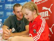 13 September 2010; 13 September 2010; Cork Footballer Pearse O'Neill has a chat with Maeve Lynch, Minane Bridge, while signing autographs for young fans at Lifestyle Sports, Mahon Point Shopping Centre, Cork. Picture Credit: John Sheehan Photography