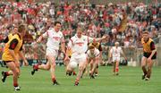 14 August 1994; Larry Tompkins, Cork, supported by team-mate Shea Fahy, in action against Paul Higgins, left, and Brian Burns, Down. Bank of Ireland Football Championship Semi-Final, Down v Cork, Croke Park, Dublin. Picture credit: David Maher / SPORTSFILE