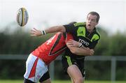 17 September 2010; Scott Deasy, Munster A, gets his pass away as he is tackled by Tommy Seymour, Ulster Ravens. A Interprovincial Championship, Munster A v Ulster Ravens, Nenagh RFC, Nenagh, Co. Tipperary. Picture credit: Diarmuid Greene / SPORTSFILE