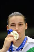 18 September 2010; Katie Taylor, Ireland, with her gold medal after her victory over Cheng Dong, China, during their 60kg Lightweight Final. AIBA Women World Boxing Championships Barbados 2010 - Finals, Garfield Sobers Sports Gymnasium, Bridgetown, Barbados. Picture credit: Stephen McCarthy / SPORTSFILE