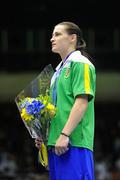 18 September 2010; Katie Taylor, Ireland, during the national anthem after receiving her gold medal following her victory over Cheng Dong, China, during their 60kg Lightweight Final. AIBA Women World Boxing Championships Barbados 2010 - Finals, Garfield Sobers Sports Gymnasium, Bridgetown, Barbados. Picture credit: Stephen McCarthy / SPORTSFILE