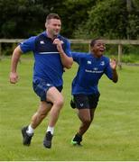 27 July 2016; Leinster's Fergus McFadden races Thomas Amoo, age 12, from Kildare Town, during the Bank of Ireland Leinster Rugby Summer Camp at Cill Dara RFC in Dunmurray West, Kildare. Photo by Piaras Ó Mídheach/Sportsfile
