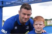 27 July 2016; Leinster's Fergus McFadden poses for a photograph with Noah Quinn, age 7, from Kildare Town, during the Bank of Ireland Leinster Rugby Summer Camp at Cill Dara RFC in Dunmurray West, Kildare. Photo by Piaras Ó Mídheach/Sportsfile
