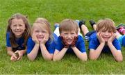 27 July 2016; Participants, from left, Zoe Bagnell, age 5, from Kildare Town, Emma Keane, age 5, from Kildare Town, Daniel Connolly, age 7, from Monasterevin, and Daniel O'Gorman, age 7, from Kilcullen, during the Bank of Ireland Leinster Rugby Summer Camp at Cill Dara RFC in Dunmurray West, Kildare. Photo by Piaras Ó Mídheach/Sportsfile