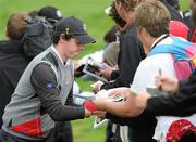 28 September 2010; Rory Mcllroy, Team Europe, signs autographs during his round. 2010 Ryder Cup - Practice Day, The Celtic Manor Resort, City of Newport, Wales. Picture credit: Matt Browne / SPORTSFILE