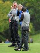 28 September 2010; Vice captain Darren Clarke with team captain Colin Montgomerie and Rory Mcllroy, Team Europe, on the 12th fairway. 2010 Ryder Cup - Practice Day, The Celtic Manor Resort, City of Newport, Wales. Picture credit: Matt Browne / SPORTSFILE