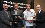 30 September 2010; Presenting John McGreery and Geoff Murray of Ridgeway Rovers FC, Dundonald, Co. Down, with their award at the 2010 Texaco Sportstars Bursaries Awards Presentation are Eddie Keher, left, and Enda Riney, right, Country Chairman of Chevron Ireland. Conrad Hotel, Earlsfort Terrace, Dublin. Picture credit: Barry Cregg / SPORTSFILE