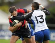 2 October 2010; Niall Morris, Blackrock, is tackled by Simon Zebo, Cork Constitution. All-Ireland League Division 1, Blackrock v Cork Constitution, Stradbrook Road, Blackrock, Co. Dublin. Picture credit: Brendan Moran / SPORTSFILE