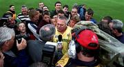11 August 2001; Kerry manager Páidí Ó Sé is surrounded by fans while giving an interview after the Bank of Ireland All-Ireland Senior Football Championship Quarter-Final Replay match between Dublin and Kerry at Semple Stadium in Thurles, Tipperary. Photo by Damien Eagers/Sportsfile