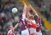 3 October 2010; Tomas Sheehy, 8, and James Holmes, Castletown, in action against Stephen Byrne and J.P Connolly, left, Kilanerin. Wexford County Senior Football Championship Final, Castletown v Kilanerin, Wexford Park, Wexford. Picture credit: David Maher / SPORTSFILE