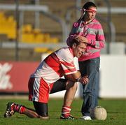 3 October 2010; Matty Forde, Kilanerin, is consoled by a supporter at the end of the game. Wexford County Senior Football Championship Final, Castletown v Kilanerin, Wexford Park, Wexford. Picture credit: David Maher / SPORTSFILE