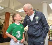 4 October 2010; Jonathan Houlihan, from Dungarvan, Co. Waterford, with Republic of Ireland manager Giovanni Trapattoni at the announcement today by 3, Ireland’s largest high speed network, and the Football Association of Ireland of the mascot when the senior national team play Russia in the Aviva Stadium on October 8th. Lucky Jonathan Houlihan will have the chance of a lifetime to lead the team onto the pitch with Republic of Ireland captain Robbie Keane. The announcement was made at the team training session today where Jonathan got a chance to see his idols in action. For more information about 3 visit www.3football.ie. Portmarnock Hotel, Portmarnock, Co. Dublin. Picture credit: David Maher / SPORTSFILE