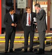 5 October 2010; Munster's Lifeimi Mafi, left, with team manager Sean Payne, centre, and legal representitive Donal Spring leaving the IRFU disciplinary hearing for a complaint against him from the Leinster v Munster Celtic League game on Saturday, 2nd October. IRFU Disciplinary Hearing, IRFU Ulster Branch, Ravenhill, Belfast Picture credit: Oliver McVeigh / SPORTSFILE