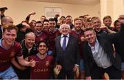 5 August 2016; The President of Ireland Michael D. Higgins with the Galway United team and staff in their dressing room after defeating Dundalk during the SSE Airtricity League Premier Division match between Galway United and Dundalk at Eamonn Deasy Park in Galway. Photo by David Maher/Sportsfile