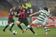 10 October 2010; Ruaidhri Higgins, Bohemians, in action against Efrain Juarez, Glasgow Celtic. Bohemians v Glasgow Celtic, Dalymount Park, Dublin. Picture credit: David Maher / SPORTSFILE