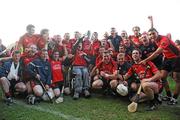 10 October 2010; Oulart the Ballagh players, staff and fans celebrate with the cup. Wexford County Senior Hurling Championship Final. Oulart the Ballagh v St Martin's, Wexford Park, Wexford. Picture credit: Matt Browne / SPORTSFILE