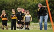 9 May 2010; Coach Pauric Killeen gives some directions to the Under 6's during La na gClub activities at the Austin Stacks GAA Club in Tralee. 2010 La na gClub, Austin Stacks GAA Club, Tralee, Co. Kerry. Picture credit: Brendan Moran / SPORTSFILE