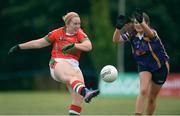 9 August 2016; Hillary Ennis of Canada in action against Joanne O'Regan of Britain Father Murphy's during the Etihad Airways GAA World Games 2016 - Day 1 at UCD in Dublin. Photo by Cody Glenn/Sportsfile