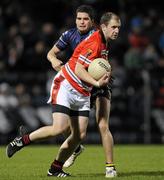 20 October 2010; Donal Og O'Donovoan, Third Level Colleges, in action against Leigh Montagna, Australia. International Rules Warm-Up Match, Third Level Colleges v Australia, Pairc Ui Chaoimh, Cork. Picture credit: Matt Browne / SPORTSFILE