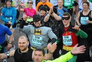 25 October 2010; 'Batman and Robin' John Doherty, from Maynooth, Co. Kildare, and Ian Finlay, from Glasnevin, Dublin, in action during the Lifestyle Sports - adidas Dublin Marathon 2010. Dublin. Picture credit: Stephen McCarthy / SPORTSFILE