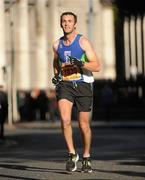 25 October 2010; Micky Donnelly, from Armagh, in action during the Lifestyle Sports - adidas Dublin Marathon 2010, Merrion Square, Dublin. Picture credit: Barry Cregg / SPORTSFILE