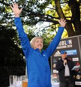 25 October 2010; Lorraine Manning, Raheny Shamrock A.C., celebrates on the podium after finishing in third place in the Irish Women's National Marathon Championships during the Lifestyle Sports - adidas Dublin Marathon 2010. Dublin. Picture credit: Stephen McCarthy / SPORTSFILE