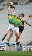 12 August 2016; Brian Geraghty, left, and Gavin Murphy of Abu Dhabi Na Fianna challenge Eion O Reilly of Middle East, right, during Day 4 of the Etihad Airways GAA World Games 2016 at Croke Park in Dublin. Photo by Seb Daly/Sportsfile