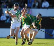 24 October 2010; Martin Comerford, O'Loughlin Gaels, in action against, from left, Niall Tennyson, John Dalton, and Luke Gaule, Carrickshock. Kilkenny County Senior Hurling Championship Final, Carrickshock v O'Loughlin Gaels, Nowlan Park, Kilkenny. Picture credit: Brian Lawless / SPORTSFILE