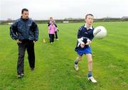 29 October 2010; Ulster bank GAA star Danny Hughes, Down, right, pictured with players, from the Ardglass GAA Under 10s and Under 12s, who won a coaching session courtesy of Ulster Bank. Ulster Bank GAA Coaching Session, Ardglass GAC, Ardglass, Co. Down. Picture credit: Oliver McVeigh / SPORTSFILE