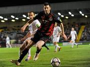 29 October 2010; Killian Brennan, Bohemians, in action against Fahrudin Kuduzovic, Dundalk. Airtricity League Premier Division, Bohemians v Dundalk, Dalymount Park, Dublin. Picture credit: Barry Cregg / SPORTSFILE