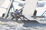 13 August 2016; Andrea Brewster and Saskia Tidey of Ireland in action during the second day of racing in the Women's 49er FX class on the Aeroporto course, Copacabana, during the 2016 Rio Summer Olympic Games in Rio de Janeiro, Brazil. Photo by David Branigan/Sportsfile