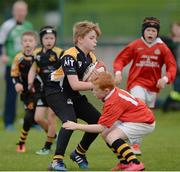 14 August 2016; James Heaslip, left, Drum Clonown, Co. Roscommon, in action against Eóin O'Byrne, Regional, Co. Limerick, during the Rugby Mini U11 & O9 Boys match at Weekend 1 of the Community Games National Festival at Athlone I.T in Athlone, Co Westmeath. Photo by Seb Daly/Sportsfile