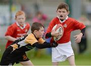 14 August 2016; Evan Cusack, right, Regional, Co. Limerick, in action against Shane Wheatley, left, Drum Clonown, Co. Roscommon during the Rugby Mini U11 & O9 Boys match at Weekend 1 of the Community Games National Festival at Athlone I.T in Athlone, Co Westmeath. Photo by Seb Daly/Sportsfile