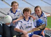 3 November 2010; Pupils from 6th class at Scoil Oilibheir, Clonsilla, Co. Dublin, from left to right, Laoise Ni Fhlannagain, Pilib O Ceallaugh and Fionnuala Ni Fhiaich at the launch of the GAA Games Development conference. Croke Park, Dublin. Picture credit: David Maher / SPORTSFILE