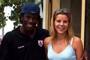 22 August 2001; Longford Town striker Eric Lavine is welcomed by Danyela Nitzova on arrival at Sofia Airport in Bulgaria ahead of the UEFA Cup First Qualifying Round Second Leg match between Liteks Lovetch and Longford Town. Photo by Damien Eagers/Sportsfile