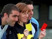 24 August 2001; Pictured at the announcement that eircom is to sponsor the Referees' Panel of the eircom League is Hilda McDermot with Andy Myler of Athlone Town, left, and Robert Farrell of Dublin City. Hilda is the first woman official to join the eircom League's Referees' Panel and runs the line at the Dublin City versus Athlone game on Saturday evening. Photo by Ray McManus/Sportsfile