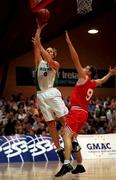 25 August 2001; Ireland's Dan Callahan, 14, goes for a layup against Marc Thurig of Switzerland during the European Basketball Championships Qualifier match between Ireland and Switzerland at the National Basketball Arena in Tallaght, Dublin. Photo by Brendan Moran/Sportsfile