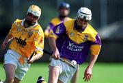 25 August 2001; Redmond Barry of Wexford in action against Michael McClements of Antrim during the All-Ireland U21 Hurling Championship Semi-Final match between Wexford and Antrim at Parnell Park in Dublin. Photo by Ray Lohan/Sportsfile