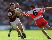 26 August 2001; Derek Savage of Galway is tackled by Gary Coleman of Derry during the Bank of Ireland All-Ireland Senior Football Championship Semi-Final match between Galway and Derry at Croke Park in Dublin. Photo by Ray McManus/Sportsfile