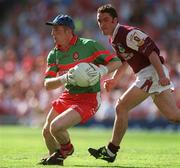 26 August 2001; Derry goalkeeper Owen McCloskey is tackled by Alan Kerins of Galway during the Bank of Ireland All-Ireland Senior Football Championship Semi-Final match between Galway and Derry at Croke Park in Dublin. Photo by Ray McManus/Sportsfile