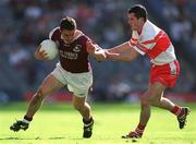 26 August 2001; Alan Kerins of Galway in action against Johnathan Niblock of Derry during the Bank of Ireland All-Ireland Senior Football Championship Semi-Final match between Galway and Derry at Croke Park in Dublin. Photo by Ray McManus/Sportsfile