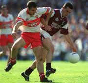 26 August 2001; Padraig Joyce of Galway in action against Sean Martin Lockhart of Derry during the Bank of Ireland All-Ireland Senior Football Championship Semi-Final match between Galway and Derry at Croke Park in Dublin. Photo by Ray McManus/Sportsfile