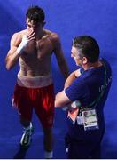 16 August 2016; Michael Conlan of Ireland with his coach and father John following his Bantamweight Quarterfinal bout with Vladimir Nikitin of Russia at the Riocentro Pavillion 6 Arena during the 2016 Rio Summer Olympic Games in Rio de Janeiro, Brazil. Photo by Stephen McCarthy/Sportsfile