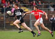 7 November 2010; Eddie Rockett, Stradbally, in action against Colm Dillon, Doonbeg. AIB Munster Senior Football Championship, Stradbally v Doonbeg, Fraher Field, Dungarvan, Co. Waterford. Picture credit: Ken Sutton / SPORTSFILE